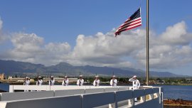 Members of the Joint Base Pearl Harbor-Hickam Honors and Ceremonies prepare to render a rifle salute during an ash scattering ceremony for Pearl Harbor survivor Benzion