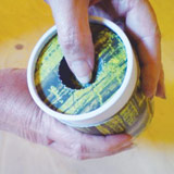 remove lid and push out perforated disc to scatter remains