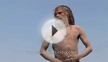 Naga Sadhu applies human ash on his body : Kumbh Mela